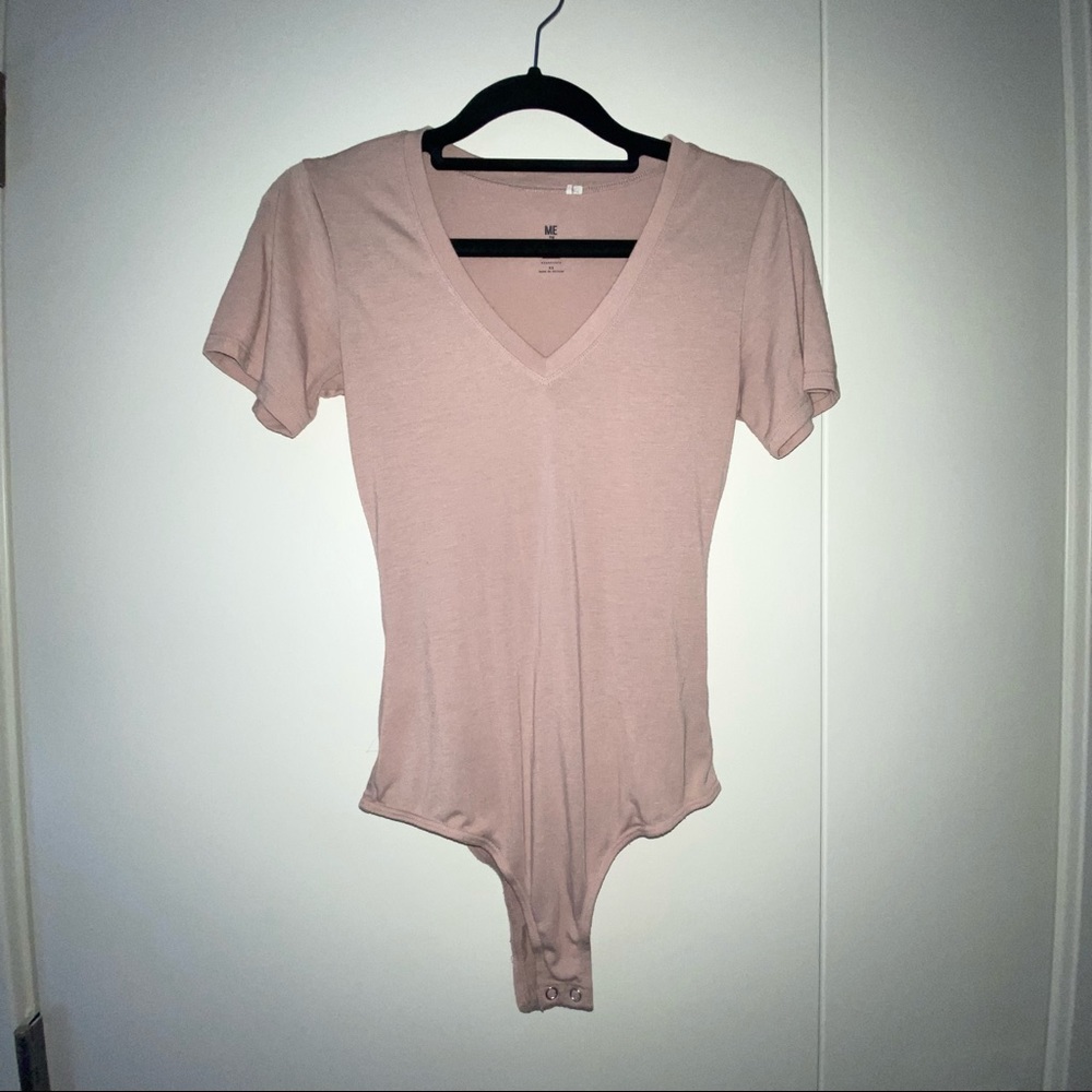 pink body suit